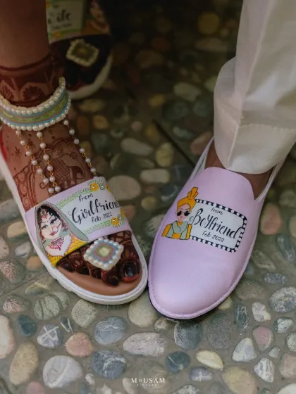 Your story is in the details. These custom-painted shoes, telling the story of their journey from boyfriend and girlfriend, are a perfect example. I love finding and focusing on these small, personal touches that make your day uniquely yours.