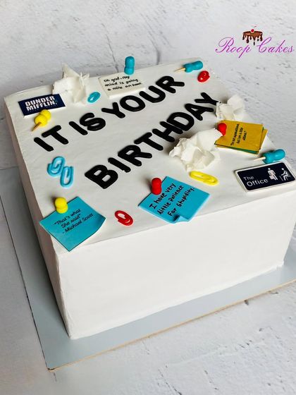 "It is your birthday." A fun and quirky cake for a fan of "The Office." The design replicates the iconic, understated birthday banner from the show, complete with sticky notes and crumpled paper.