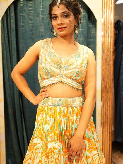 A closer look at the printed Haldi lehenga. The beaded blouse adds a touch of glam to this otherwise playful and comfortable outfit.