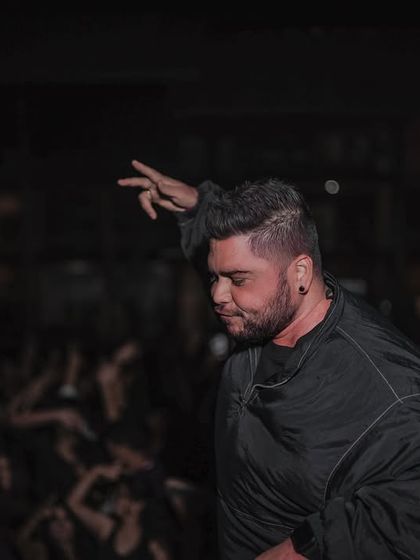Lost in the music, with the NIFT crowd as my backdrop. These are the moments of pure flow during a high-energy DJ set.