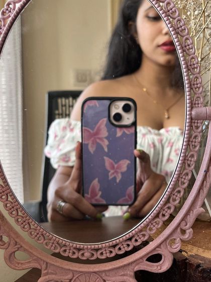 One more shot of the butterfly phone case. I love how the mirror selfie captures both the art and the artist.