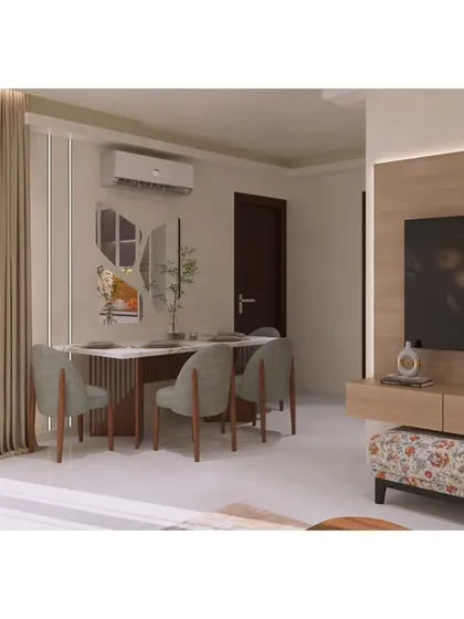 This dining area is designed to be a perfect blend of style and comfort. The sleek dining table is surrounded by elegant chairs, ideal for quiet dinners or hosting guests.