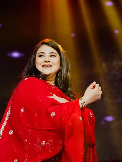 A beautiful, soft-focused shot of a family member enjoying her performance.