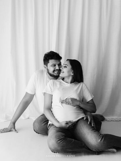 A casual and happy couple's moment in jeans and t-shirts, translated beautifully into a timeless black and white memory.