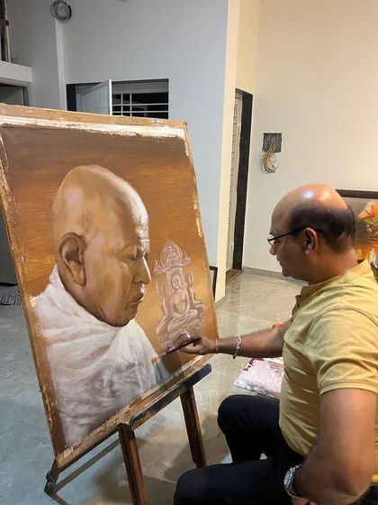 Here I am in my studio, adding fine details to the "Divine Harmony" painting.