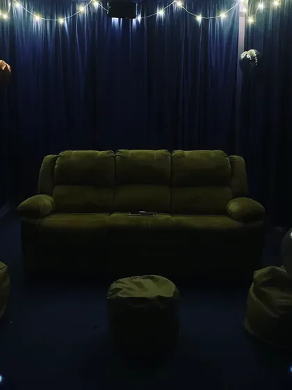Comfort is key. I've set up the space with plush recliners and cozy bean bags so you and your friends can properly relax for the full 3-hour slot. Just sink in and enjoy the show.