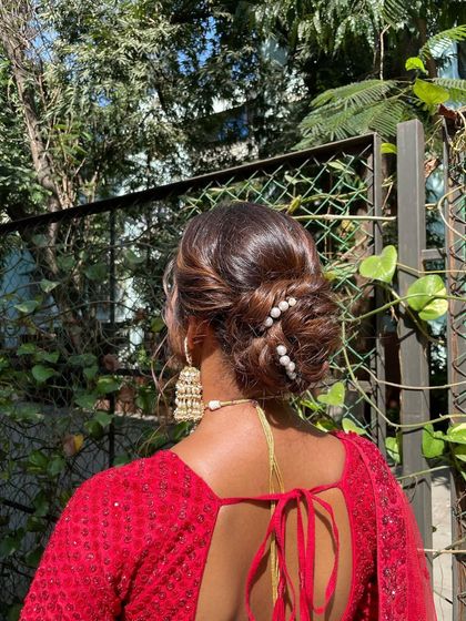 Elegant Bridal Buns & Updos photo 14