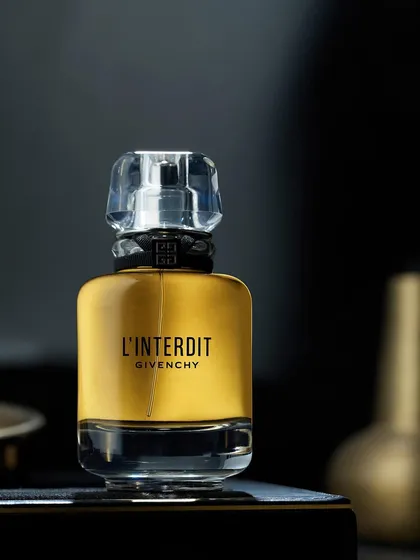For Givenchy L'Interdit, the goal was to create an aura of classic, timeless elegance. The soft lighting and dark, out-of-focus background elements give the bottle a quiet confidence and a premium feel.