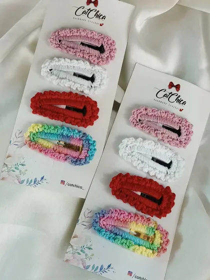 A simple set of our everyday barrettes in pink, white, red, and a lovely rainbow pastel.