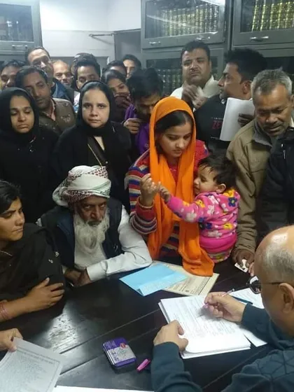 My office is a place where the common person can come without fear. Here, I am reviewing documents for families who have been wronged by the system. Yeh ladai akele mat ladiye (Don’t fight this battle alone), I am here to listen and to fight for your adhikar (rights).