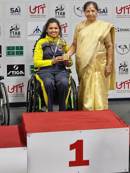 Reaching the top of the podium is our goal. This is Rajlakshmi S J being recognized as the National Champion in the women's singles category, a testament to our tournament-focused coaching program.