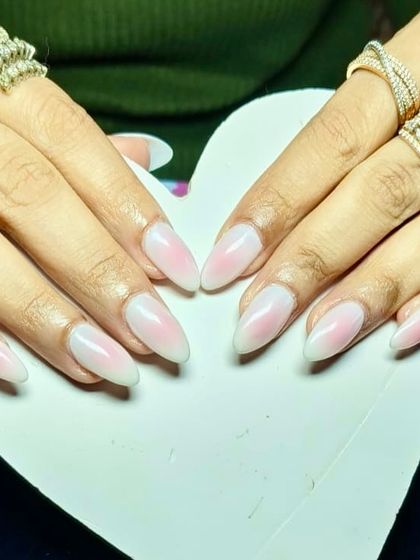 The viral ombre nails. This beautiful set showcases a soft, blended transition from a milky white tip to a natural pink base, creating a clean and sophisticated look.