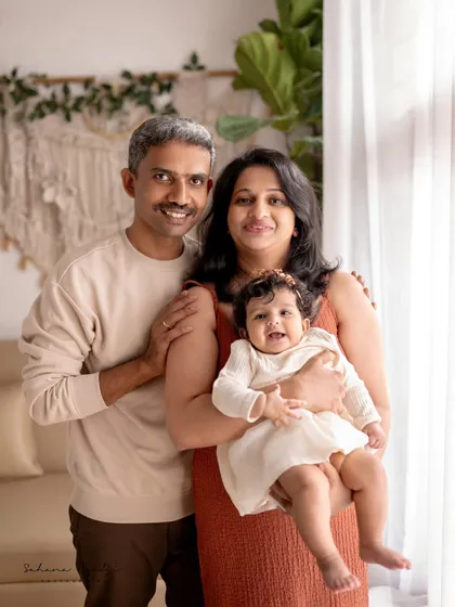 A happy family of three. The love and joy in this portrait are palpable.