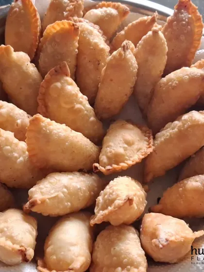 This is a picture of my first batch of Mawa Gujiyas for Holi. Every year, the demand for these traditional sweets is overwhelming, and it fills my heart with joy. Each one is handmade with a rich mawa filling, showing that some traditions, especially delicious ones, never go out of style.