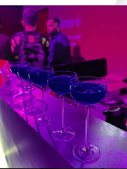 A row of our signature blue "Elderflower Kaffir Lime Spritz" cocktails ready to be served at the HSBC Plus Credit Card launch.