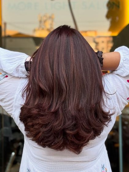 A total game-changer with Mahogany Global and babylights. This look is neat, clean, and perfect, adding subtle dimension to a rich red-brown base.