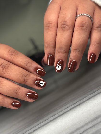 The full set of the chocolate brown and teddy bear nails. It's a sweet and charming look that's sure to make you smile.