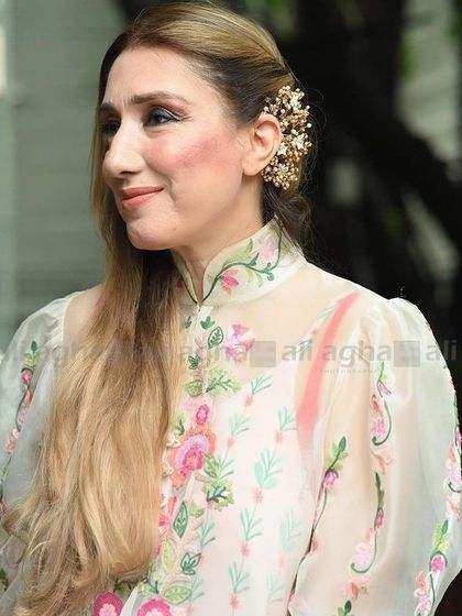 A styling tip from one of our lovely clients: keep it simple with one statement earcuff and a one-sided hairstyle.