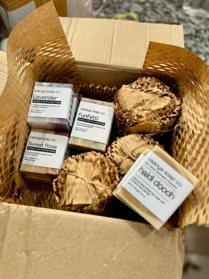The order that prompted the wonderful 5-star review, featuring a mix of our artisan soaps and body scrubs, all packed sustainably.