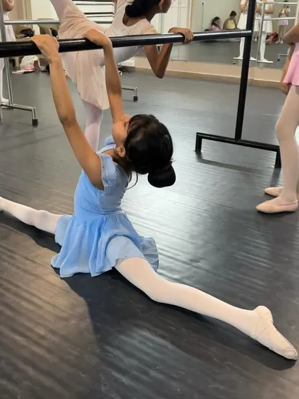 Our students are always growing. These images capture their progress in flexibility and technique, from deep splits to high extensions at the barre, with guidance from our teachers.