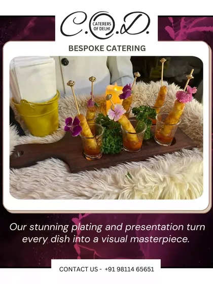 It's all in the details. Here, our crispy spring rolls are served in individual shot glasses with dipping sauce, garnished with edible flowers. This is an example of our creative appetizer presentation that elevates the guest experience.