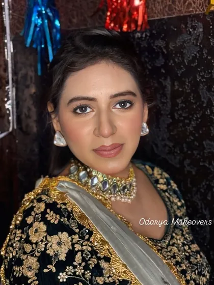 A doll-like, glowy makeup look for a wedding guest. The focus is on flawless skin and a subtle, shimmery eye.