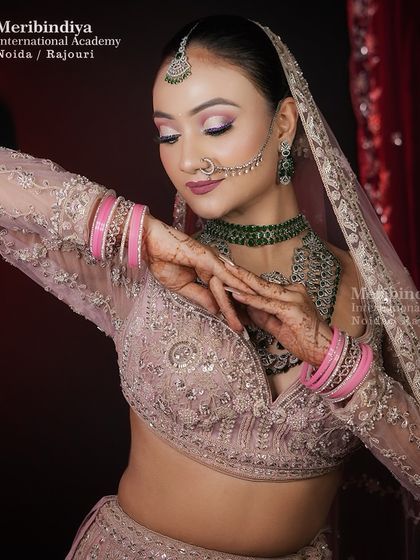 This image shows the full effect of the makeup with the sequined lehenga. You'll learn to create looks that are stunning both up close and from a distance.