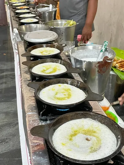 Our live dosa counter is always a crowd favorite. Watch as our chefs expertly prepare hot, crispy dosas, drizzled with our special Mayyas ghee, served fresh off the tawa right onto your guests' plates.