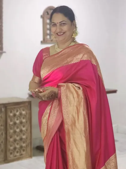 The mother of the bride and her friends, all looking elegant in traditional sarees for the wedding festivities.