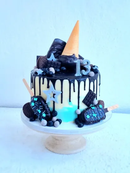A full view of the 13th birthday drip cake.
