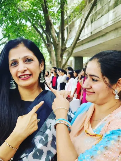 When the wearer's inborn style is as good as her earring. Two women entrepreneurs from IIM Bangalore looking graceful in our silver replica dangles.
