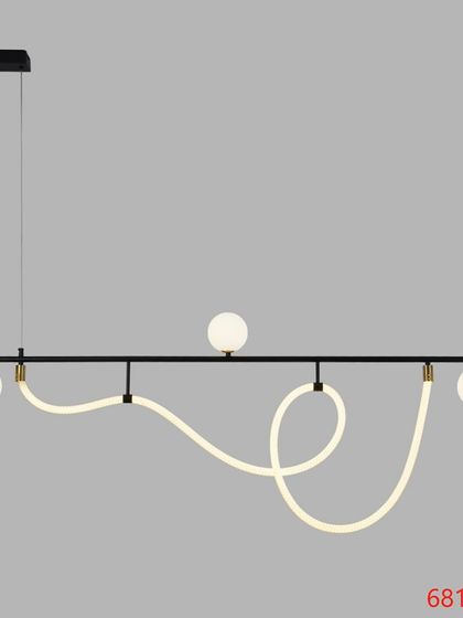 A playful and modern linear pendant with a flexible light tube. This fixture allows you to create your own design.
