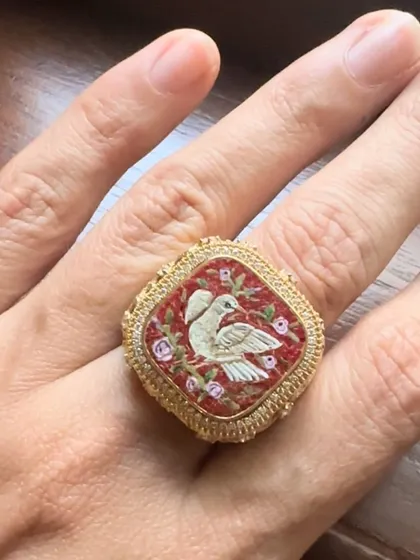 My lovebird ring, featuring two doves in micromosaic on a rich red background. This piece symbolizes love, peace, and happiness.