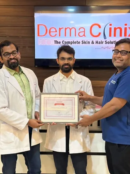 A certificate presentation for Dr. Santosh Reddy. Our multi-month programs allow for deep immersion into the practice of hair restoration.