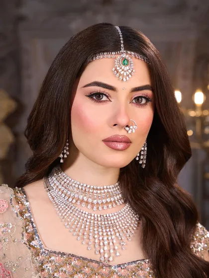 A detailed close up of the eye makeup and flawless skin. This is a perfect example of a soft glam look that is both timeless and modern.