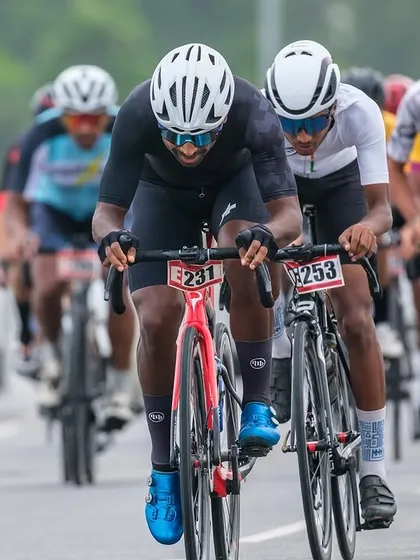 Two elite riders sprint for the line, a thrilling conclusion to a hard-fought race.
