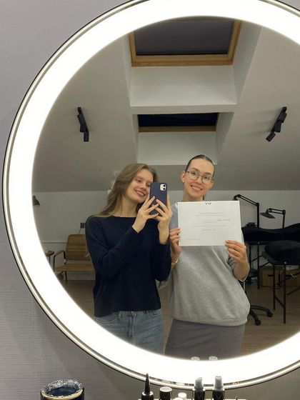 A happy student and her instructor taking a celebratory selfie after completing a training course. We build strong, supportive relationships with our students.