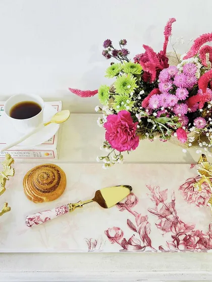 Add a pop of colour to your dining decor with our Cherry Blossom starter tray. The delicate pink floral print and elegant gold branch handles make it perfect for breakfast in bed or afternoon tea.