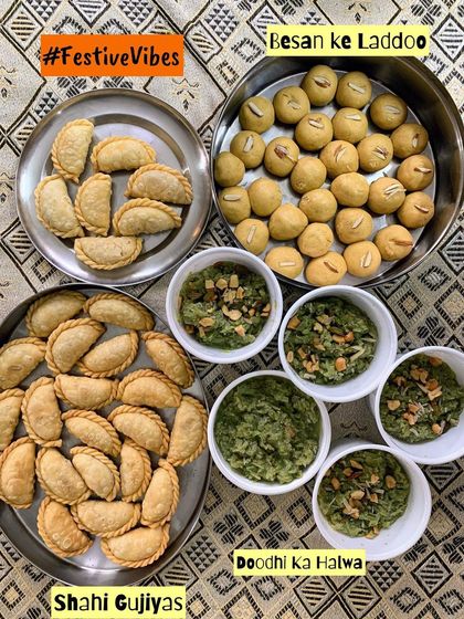 A beautiful festive platter with homemade Besan ke Laddoos, Shahi Gujiyas, and Doodhi ka Halwa. These are the tastes that make celebrations feel like home.