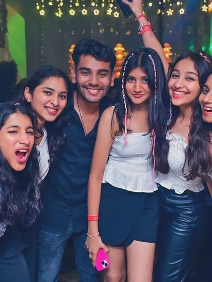 A fun group photo capturing the excitement of a Thursday night out.