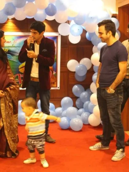 On stage with my happy clients. My job is to make sure the family can relax and enjoy the party while I handle the entertainment.