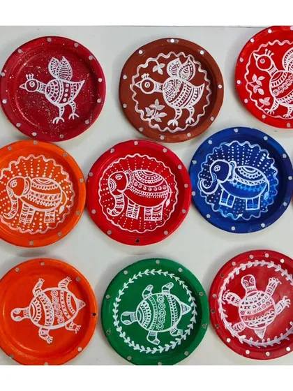 Look at these vibrant Mandala-style paintings on plates, a favorite activity from our summer camp. We teach traditional art forms in a fun, accessible way, letting each child add their own unique touch.