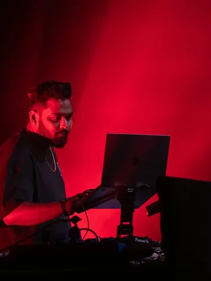 'Straight Ballin'. A moody shot with intense red lighting, capturing the serious side of my craft.