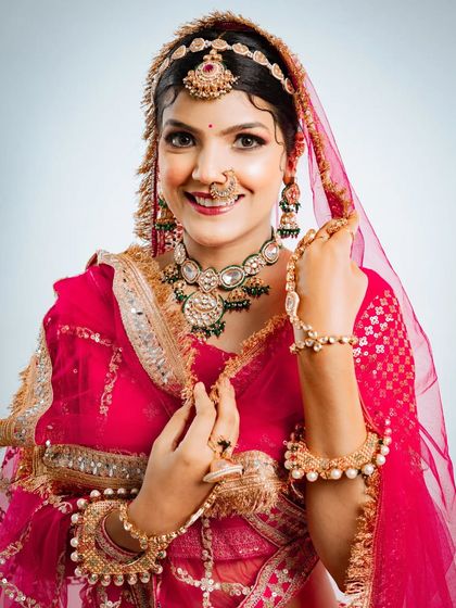 A beautiful portrait capturing the happiness and confidence of a bride in her traditional attire.