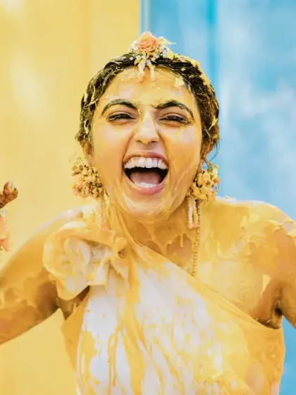 I live for the chaos and the uninhibited joy. This moment from a Haldi ceremony is pure, unapologetic fun. It’s about letting go, being present, and celebrating with every part of your soul.