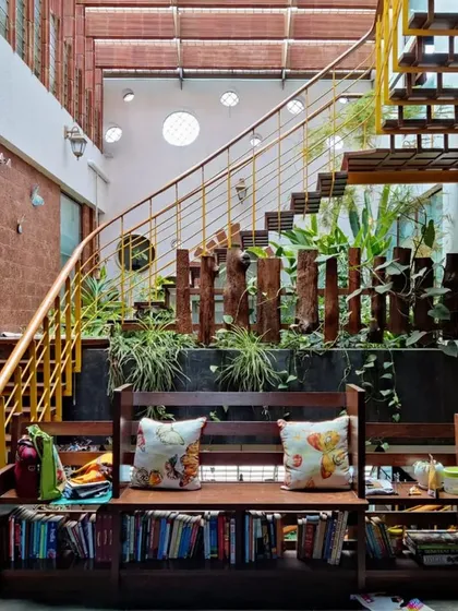 I believe gardens shouldn't just surround a house, they should live within it. This staircase has a thriving garden at its core, a green space that brings life and fresh air right into the center of the home, transforming a simple flight of stairs into a living feature.