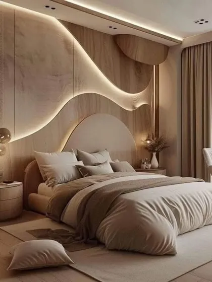 This bedroom features a stunning accent wall with curved wooden panels and soft backlighting, creating a unique and artistic focal point.