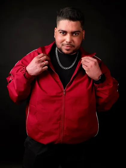 A confident look from my professional photoshoot. I present myself with the same quality and care that I put into my music.