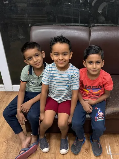 A group of happy little clients showing off their fresh cuts. I aim to make every child's visit a positive one.