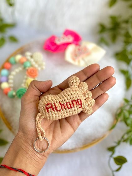 Another custom baby foot keychain, this one for baby Athang. I love how personal and meaningful these little gifts are.